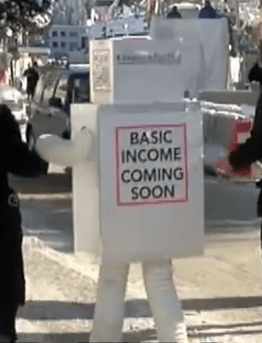 Auf dem Weltwirtschaftsforum im Schweizerischen Davos warb am 20. Januar 2016 ein tanzender Roboter für ein bedingungsloses Grundeinkommen : "basic income coming soon". (Foto: youtube/Ruptly TV)