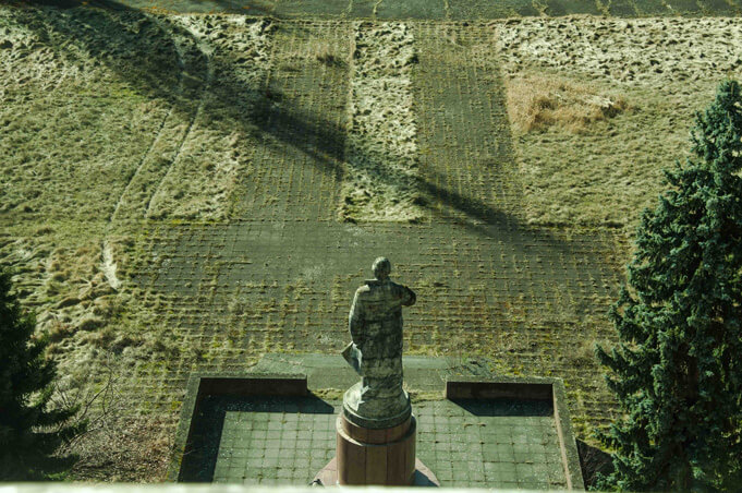 The lonely Lenin at Wünsdorf. Source.