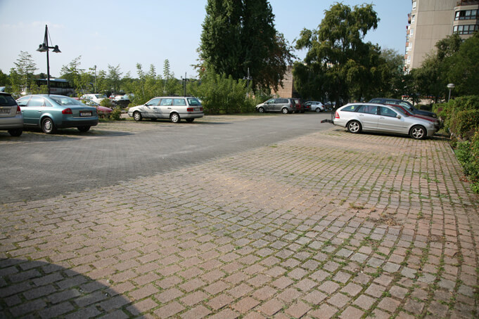 The spot of Hiter's Bunker originally in Berlin, now a parking lot. Source.